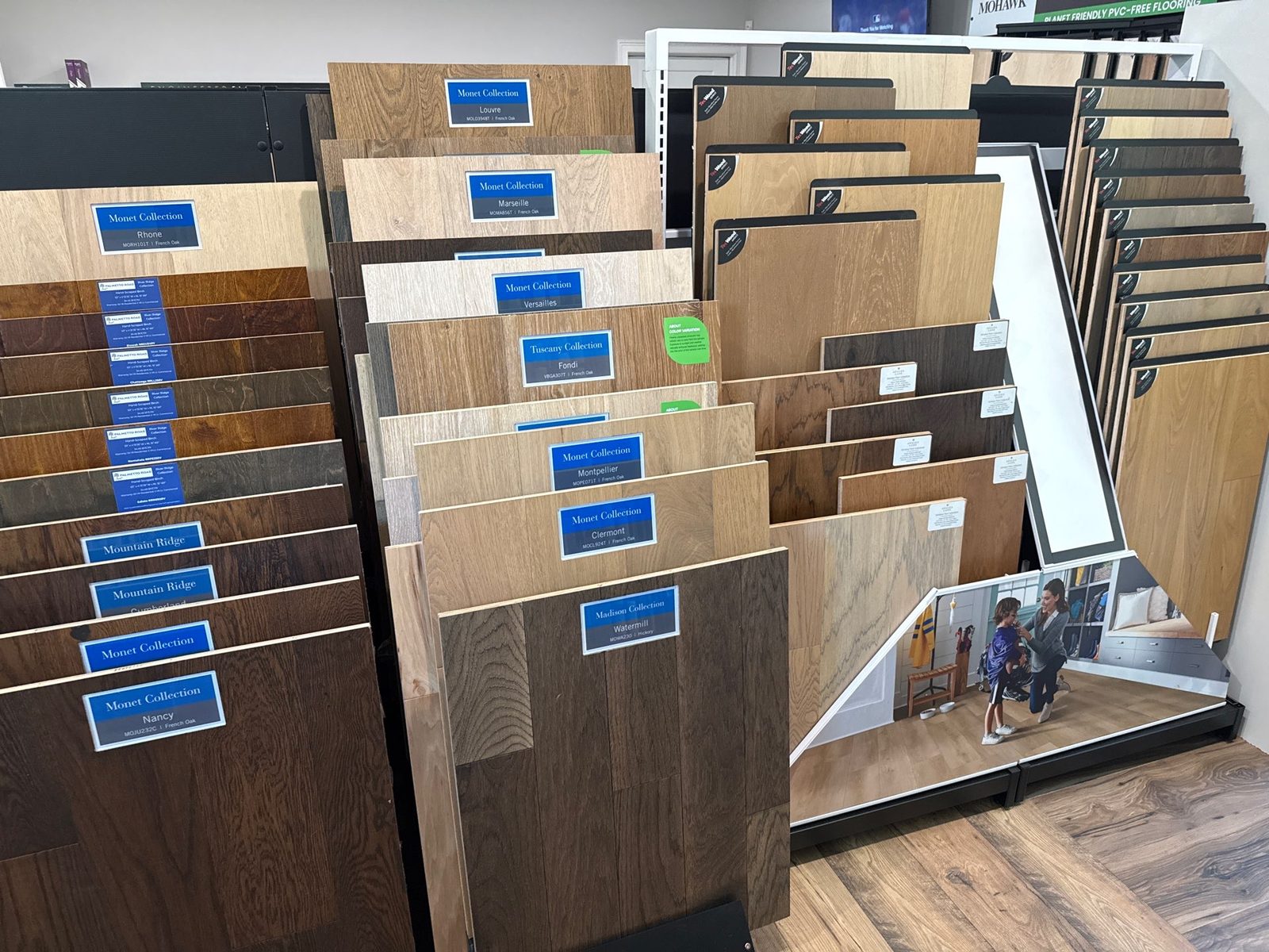 Hardwood flooring sample racks in the Mill Town Flooring showroom